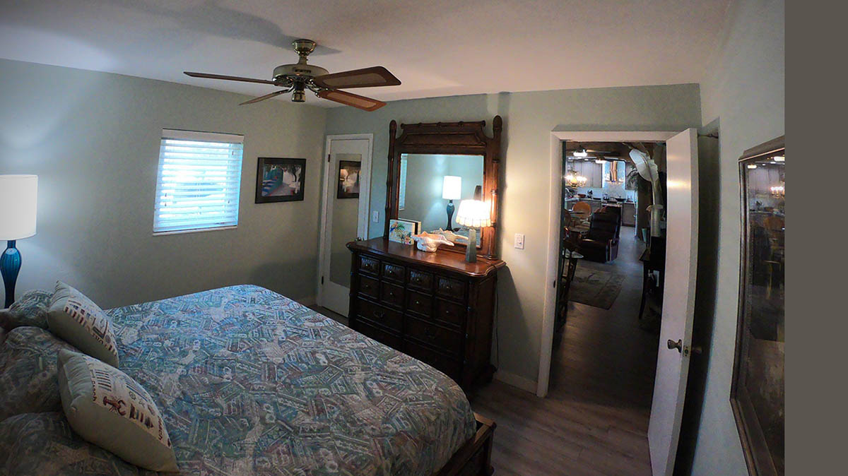 Main House Waterfront King Bedroom has a walk in closet